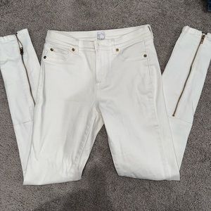 Skinny white jeans with gold zips on back pants
